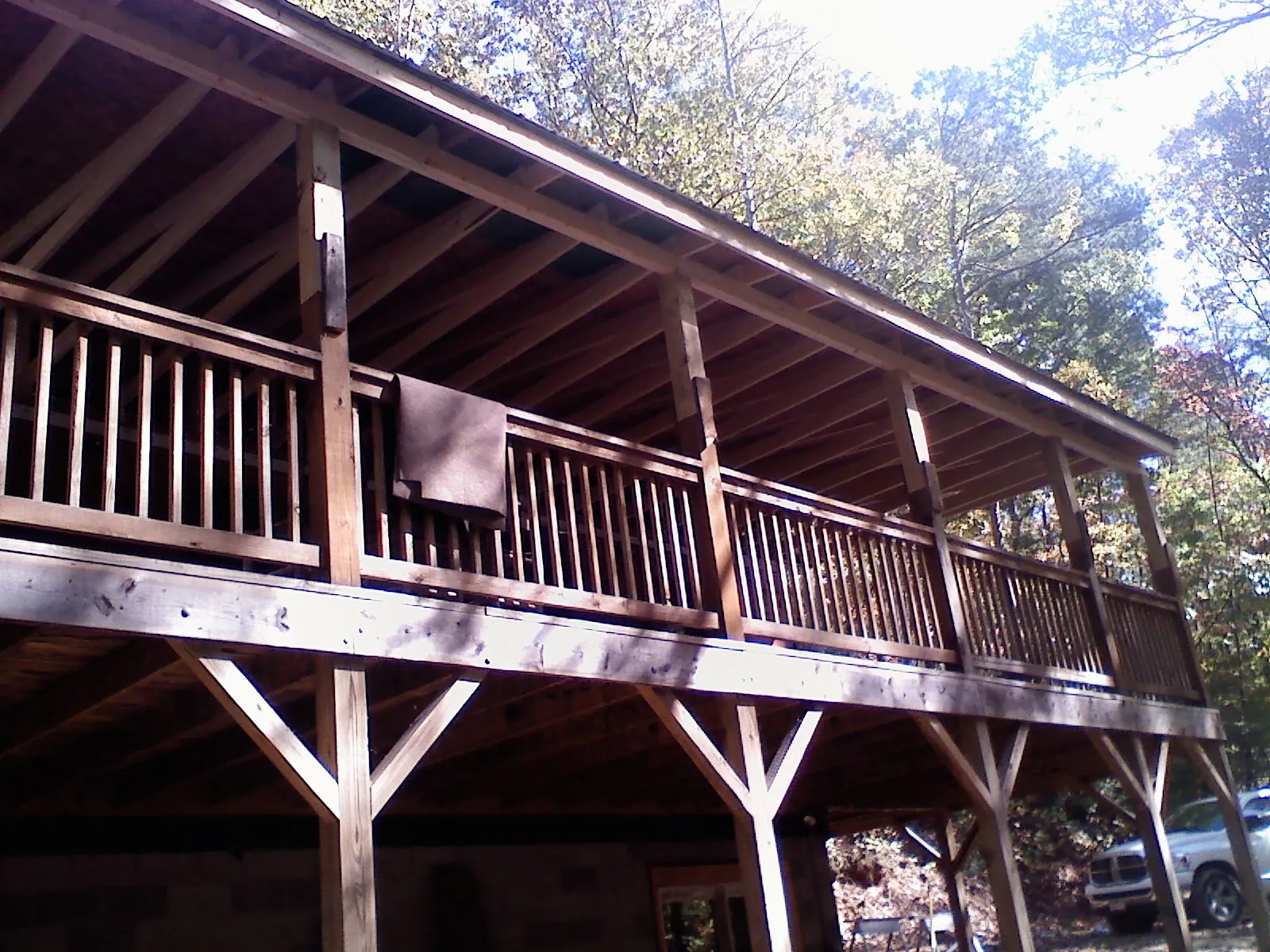 Timber framing under a new elevated porch and deck — Roof Leak Repair in Tylertown by Roofing Brothers